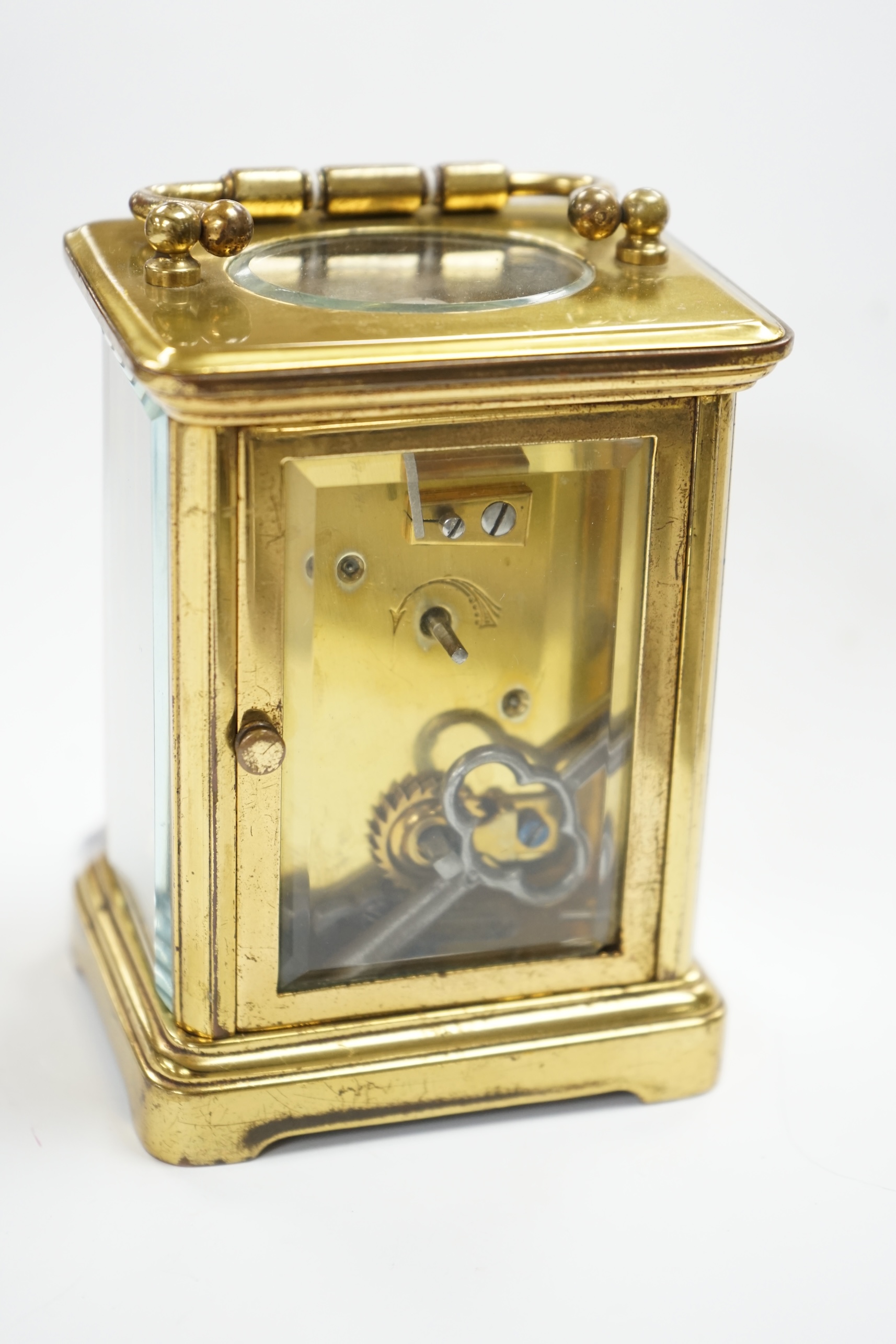 A carriage timepiece, dial stamped Ellington and Co, (with purchase receipt), 10cm high. Condition - case fair, not tested as working